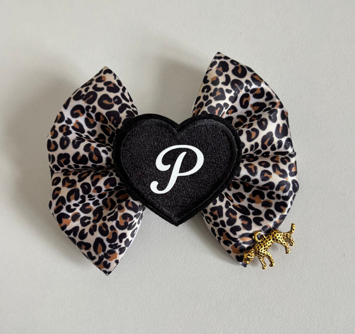 Initial leopard bow clip