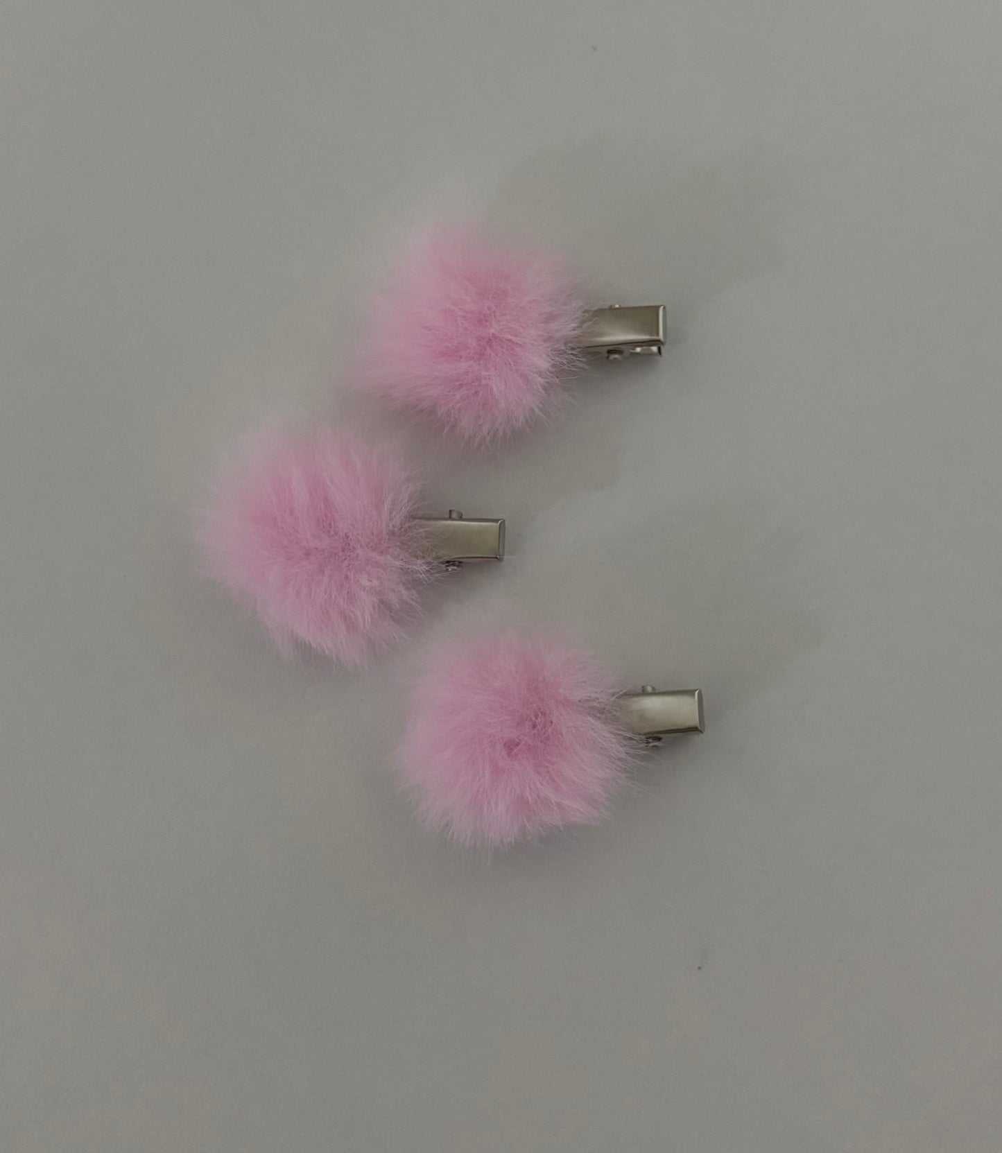 Pink pom pom clip