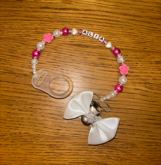 Pink and white clip with a handmade bow