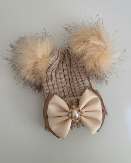 Beige pom pom hat