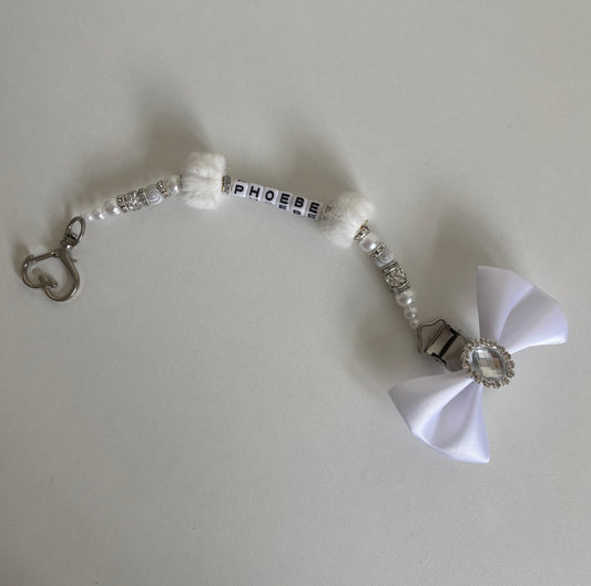 White fluffy bead dummy clip