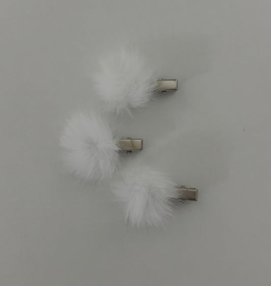 White pom pom clip