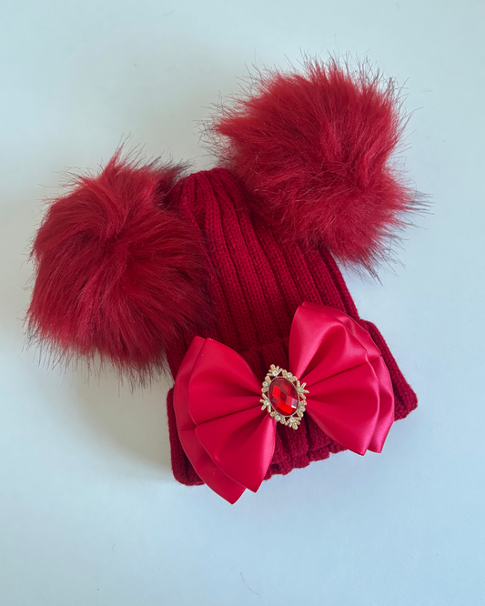 Red pom pom hat