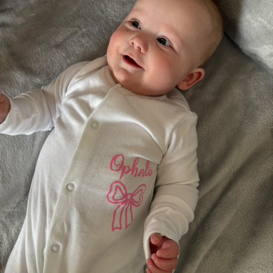 Personalised bow design sleepsuit
